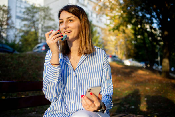 woman using albuterol inhaler