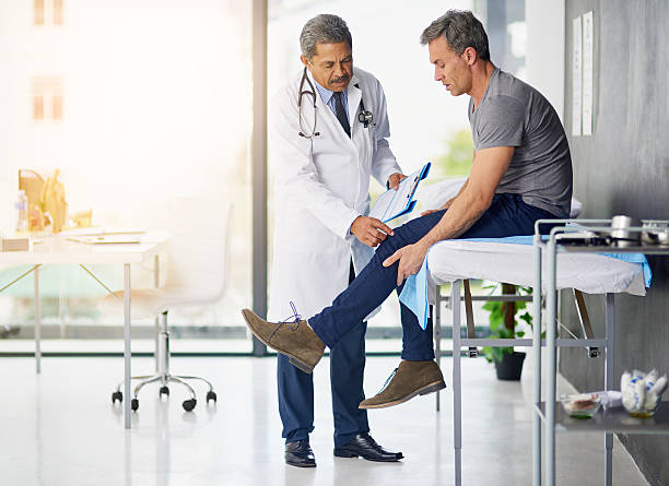 Doctor and patient discussing joint pain