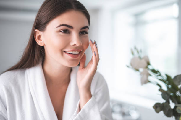 woman figuring out her skin type to know what skin care to use