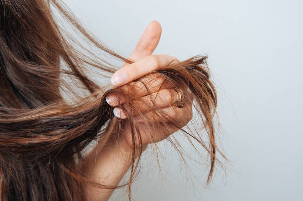 Woman checking her hair length
