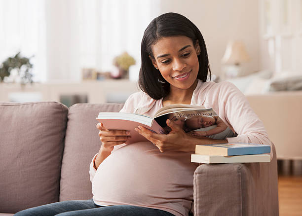Reading books about pregnancy