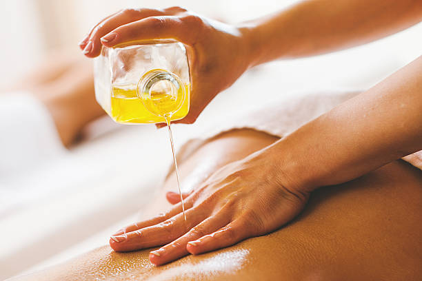 Massaging using peppermint oil that is pure