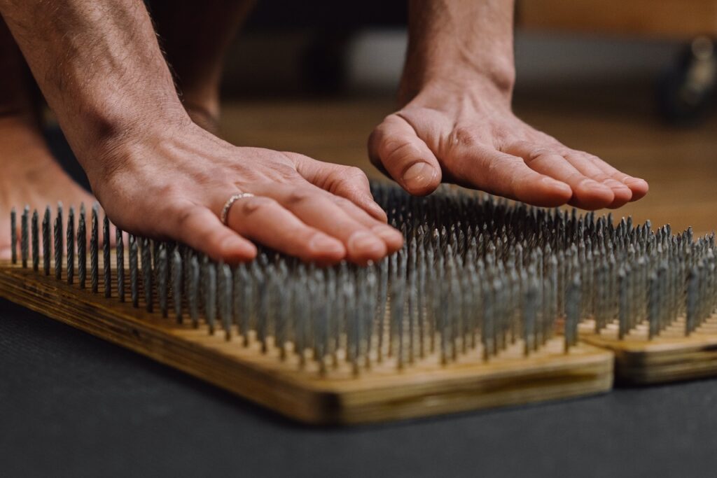 Carina Tannenberg and a bed of nails