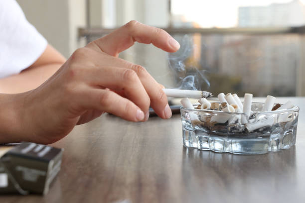 Smoking is defined as the act of inhaling and exhaling smoke created by the combustion of tobacco or another chemical.