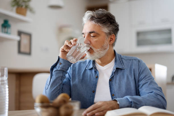 Set reminders on your phone or schedule specific times throughout the day to drink water.