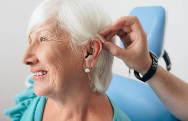 Hearing aids are small electrical devices worn within or behind the ear.