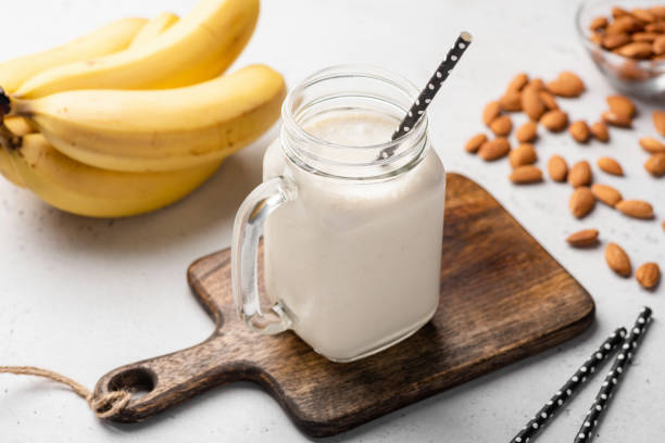 Blend a ripe banana, a cup of almond milk, and a handful of ice. This creamy and nutritious smoothie hydrates