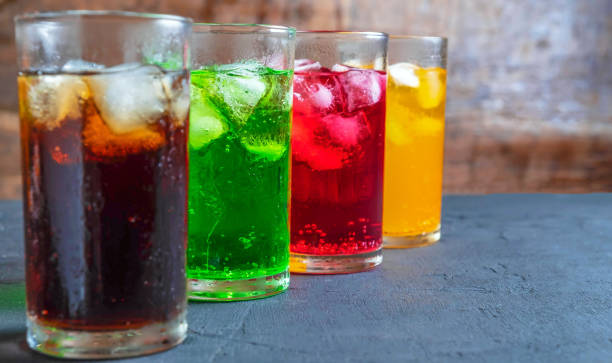 Carbonated beverages, such as soda or sparkling water, can aggravate throat pain and irritation